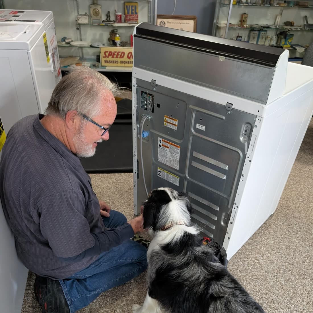 Skaggs technician repairing a washer in the shop